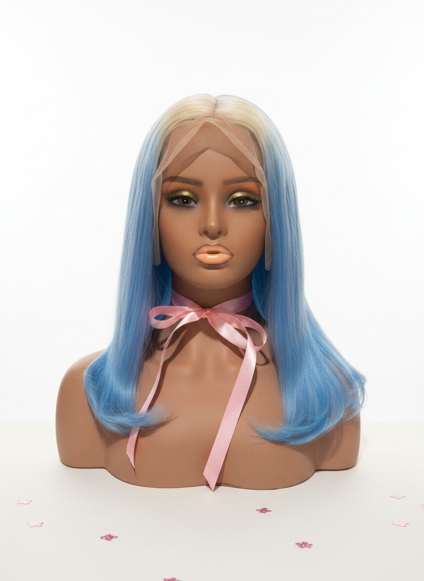 Beauté La Muse blonde and blue ombre human hair wig on a mannequin head with a pink ribbon choker