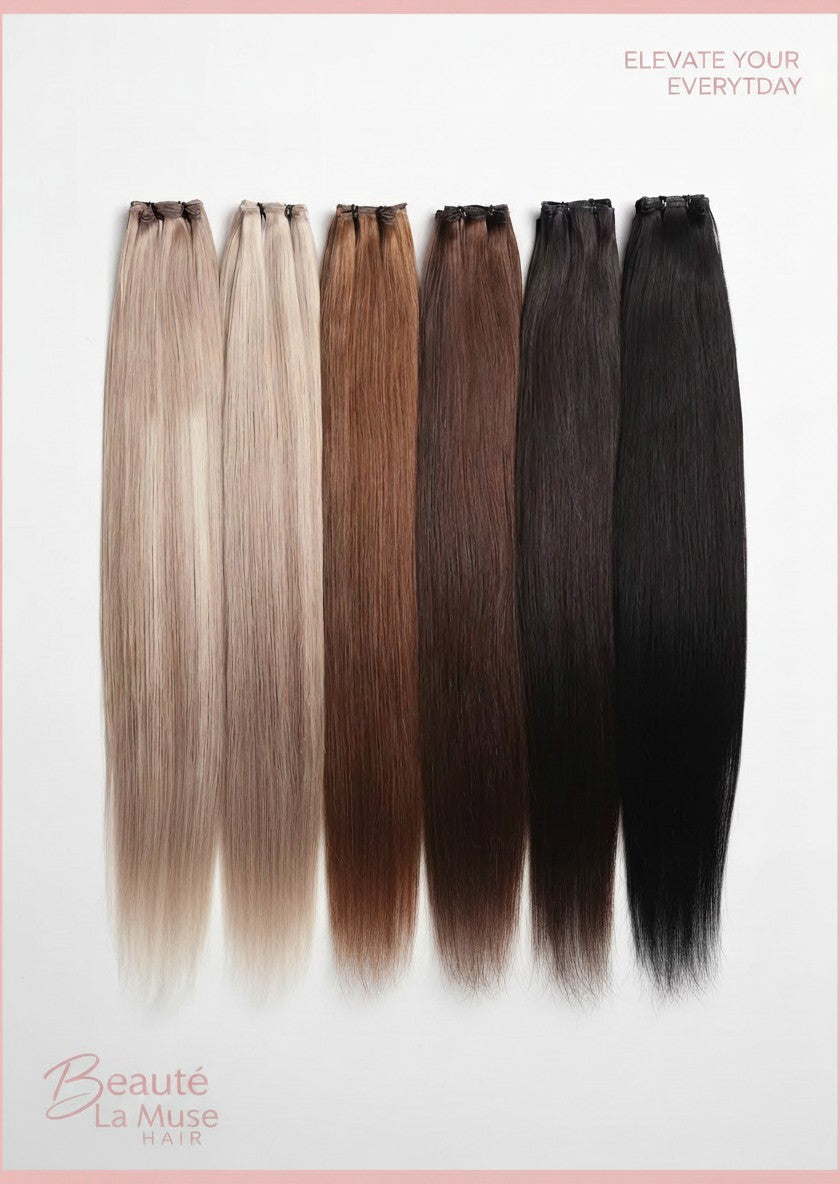 Beauté La Muse seamless clip-in human hair extensions in a gradient of blonde to black shades on a white background.